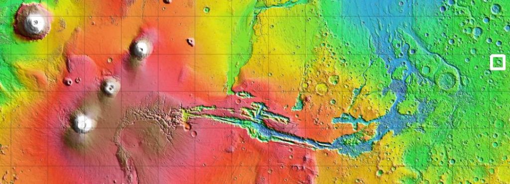 A MOLA topographic map of Mars. The featured image is from the crater at the far right, in the white square. To the left is Valles Marineris, and further to the left is the Tharsis Montes region, and Olympus Mons. Image Credit: NASA/MOLA/USGS