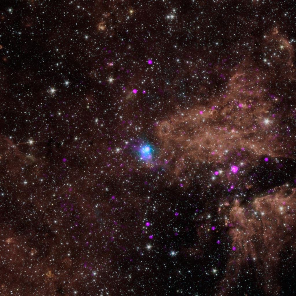 The blue dot in this image marks the spot of an energetic pulsar -- the magnetic, spinning core of star that blew up in a supernova explosion. NASA's NuSTAR discovered the pulsar by identifying its telltale pulse. Image Credit: NASA/JPL-Caltech/SAO