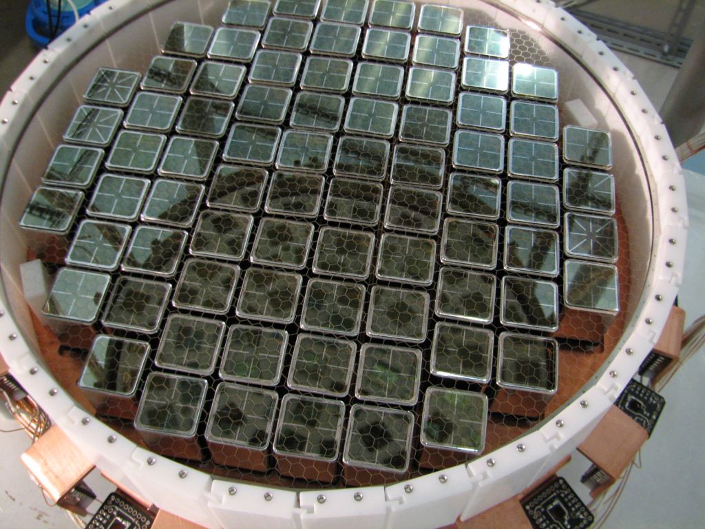 Image of the photomultipler tubes of another dark matter experiment known as XENON100, which is much more expensive than the proposed magnon experiments.
