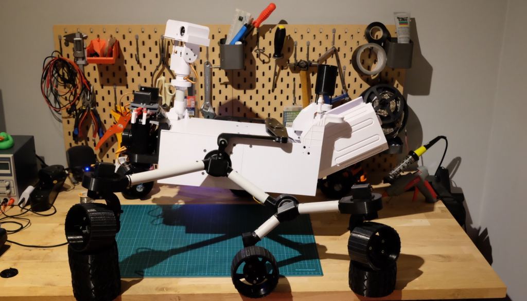 Image of the assembled Curiosity rover on a work bench.
