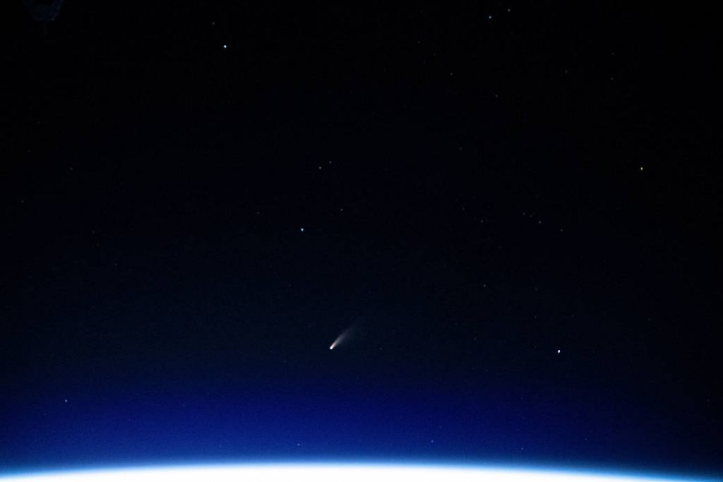 The tiny shooting star in the lower center of this image is Comet Neowise pictured from the International Space Station as it orbited above the Mediterranean Sea in between Tunisia and Italy, on July 5th, 2020. Image Credit: NASA/ISS