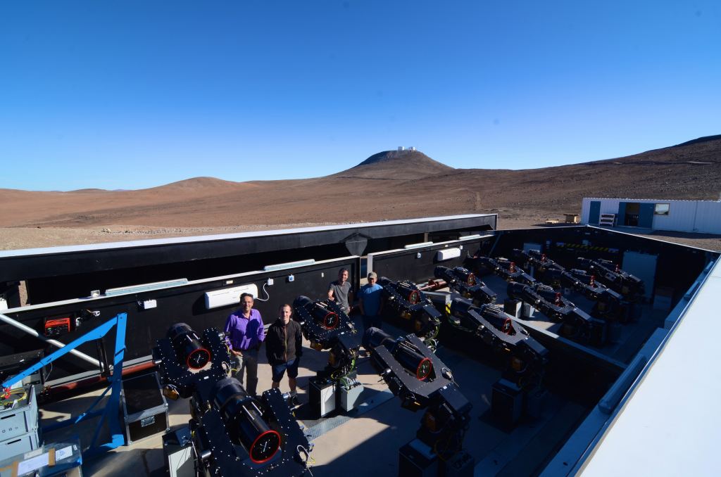 The 12 NGTS telescopes in their enclosure at the Paranal Observatory in Chile's Atacama Desert. Image Credit: G. Lambert.