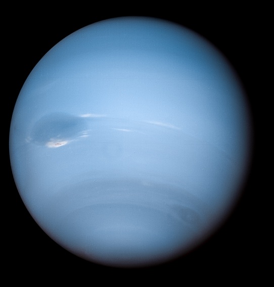 Here's Kevin's image of Neptune's Great Dark Spot, which scientists think is a hole in Neptune's methane cloud deck. It's also a calibrated combination of orange, green, and blue images form Voyager 2. Image Credit: NASA/JPL-Caltech/Kevin M. Gill
