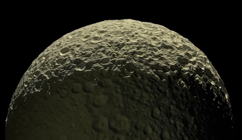 Mimas, based on Cassini images. In this image, it looks like it's so close you can reach out and touch it. Image Credit: NASA/JPL-Caltech/SSI/CICLOPS/Kevin M. Gill