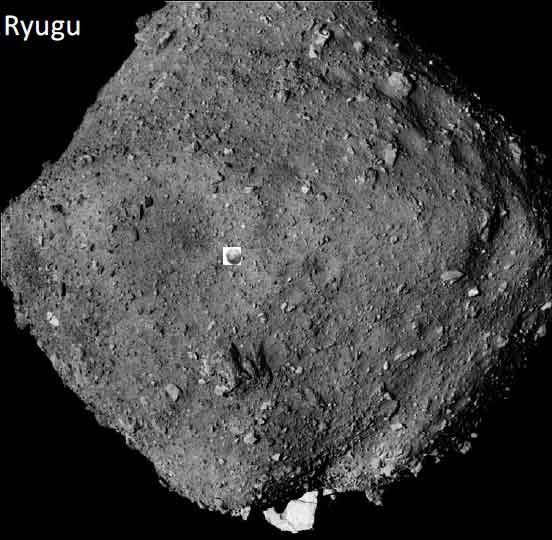 Asteroid Ryugu, Hayabusa2's first target, dwarfs 1998 KY26, its future target. The smaller asteroid is shown inset with Ryugu. Ryugu is about 30 times larger than 1998 KY26. Image Credit: Ryugu image: JAXA, University of Tokyo, Kochi University, Rikkyo University, Nagoya University, Chiba Institute of Technology, Meiji University, University of Aizu, AIST. 1998 KY26 image: Auburn University, JAXA