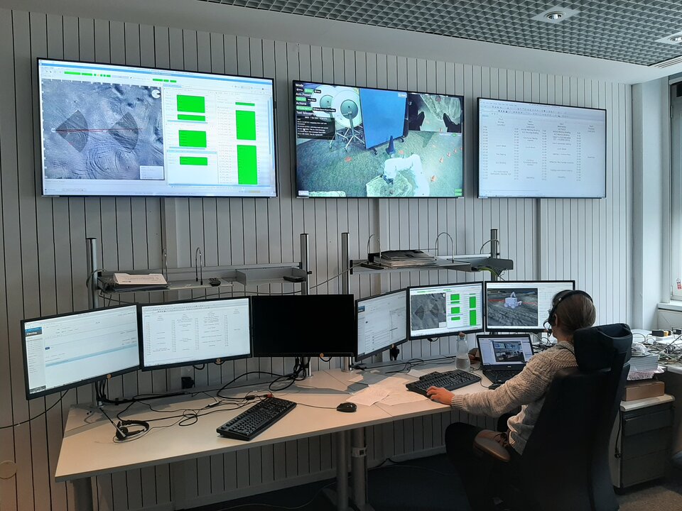 A single operator operates "mission control" for the remote Interact mission at ESA's European Space Operations Center.