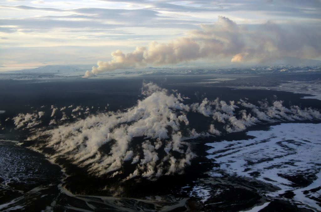 The Holuhraun lava fields with steam rising. Image Credit: Christopher Hamilton.