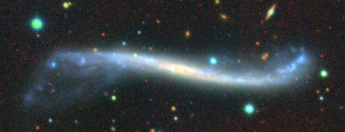 Image showing a warped spiral galaxy
