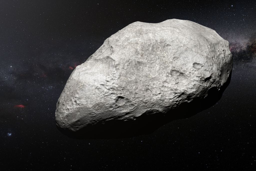2004 EW95, seen in this artist's view, may be a primordial asteroid. Its optical spectrum shows that it contains phyllosilicates, which means its rocky components were altered by the presence of water. Credit: M. Kornmesser/European Southern Observatory.