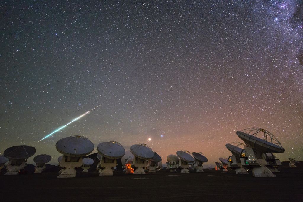 This image was taken during a time-lapse set at the Atacama Large Millimeter/submillimeter Array (ALMA.) ALMA is probably the most well-known astronomical interferometer. An interferometer works by capturing images and data from multiple dishes or telescopes in different positions. The images are then combined into a single image with much higher resolution and sensitivity than would be obtained from a single dish or telescope. Image Credit: ESO/ALMA.
