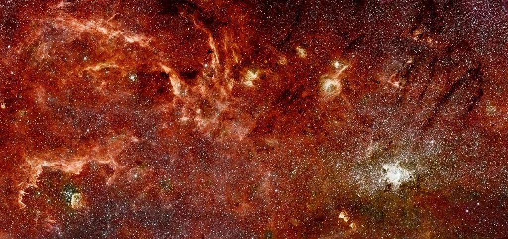 This is a composite infrared image of the Milky Way's galactic center. It shows new details in complex structures in the hot ionized gas swirling around the central 300 light-years. Image Credit: By Hubble: NASA, ESA, and Q.D. Wang (University of Massachusetts, Amherst); Spitzer: NASA, Jet Propulsion Laboratory, and S. Stolovy (Spitzer Science Center/Caltech) - NASA Image of the Day, Public Domain, https://commons.wikimedia.org/w/index.php?curid=9378571