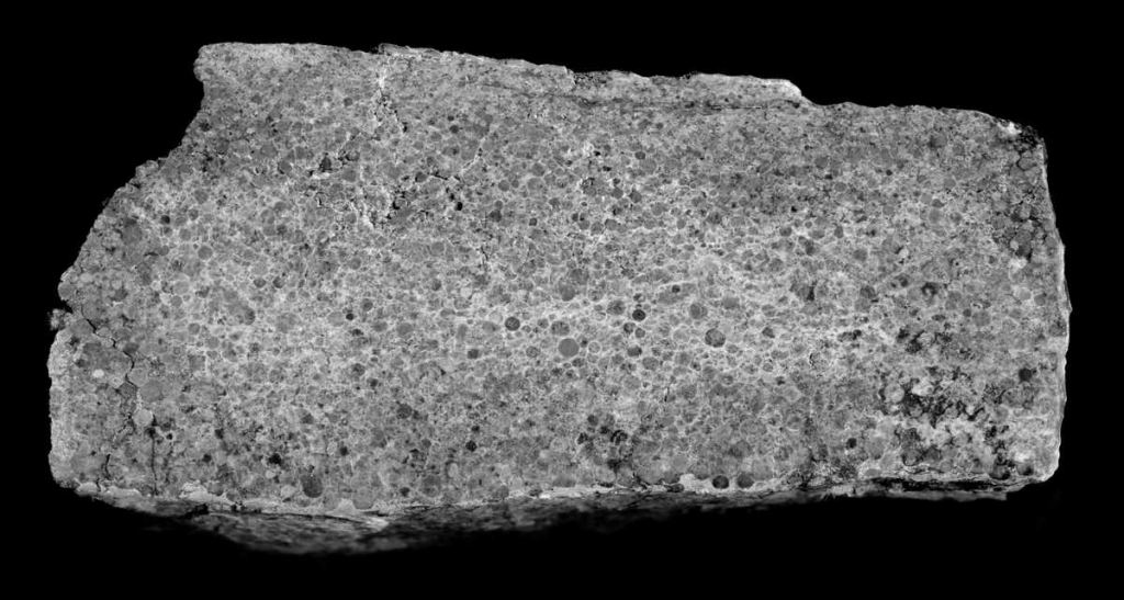 Cross-section of a spherule layer created by a major asteroid impact.