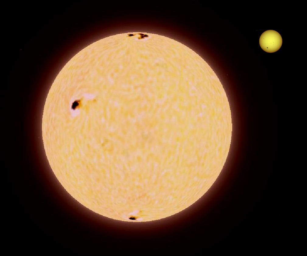 Pollux is an orange-hued giant star in the constellation Gemini. It's the closest giant star to the Sun. The image shows Pollux's size in relation to the Sun. Image Credit: Omnidoom 999. Public Domain.