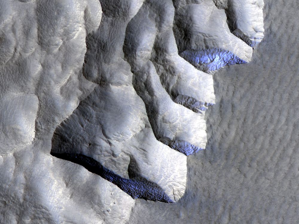 Ice Peeks out of a Cliffside on Mars