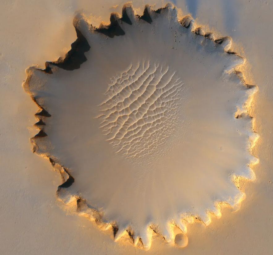 Victoria crater might be the most famous Martian crater. It was one of the HiRISE camera's HiPODs in 2006 and was also featured in National Geographic. It's an 800m diameter crater within the study area. Image Credit: By NASA/JPL/University of Arizona - http://photojournal.jpl.nasa.gov/catalog/PIA08813, Public Domain, https://commons.wikimedia.org/w/index.php?curid=4211043