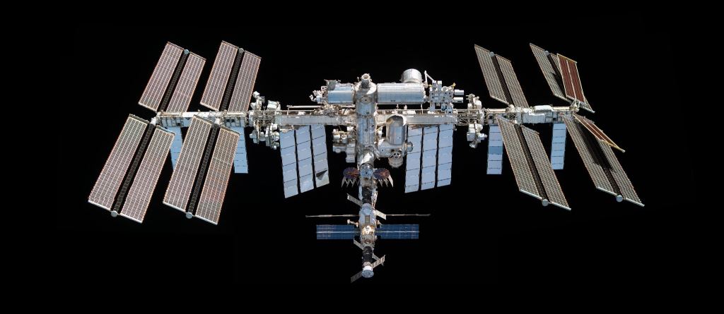 The International Space Station stretches out in an image captured by astronauts aboard the SpaceX Crew Dragon Endeavor during a fly-around in November 2021. (NASA Photo) 