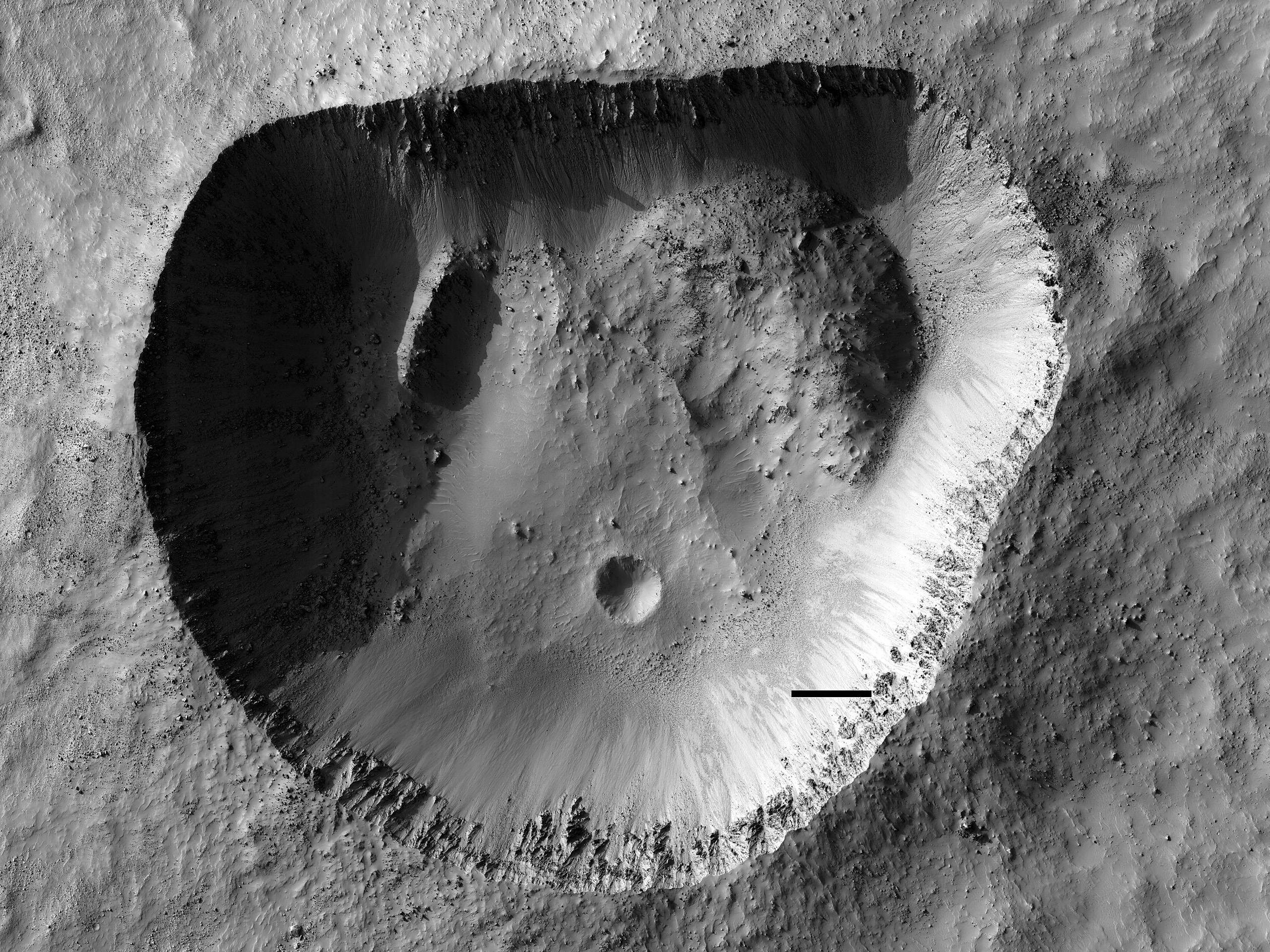 Here’s Something Rare: a Martian Crater That isn’t a Circle. What Happened?