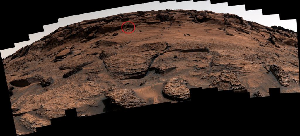 Mars Curiosity rover took a panorama of this rock cliff during its trip across Mount Sharp on Mars. Circled is the location of a so-called "doorway on Mars." Courtesy NASA/JPL/Mars Curiosity team.