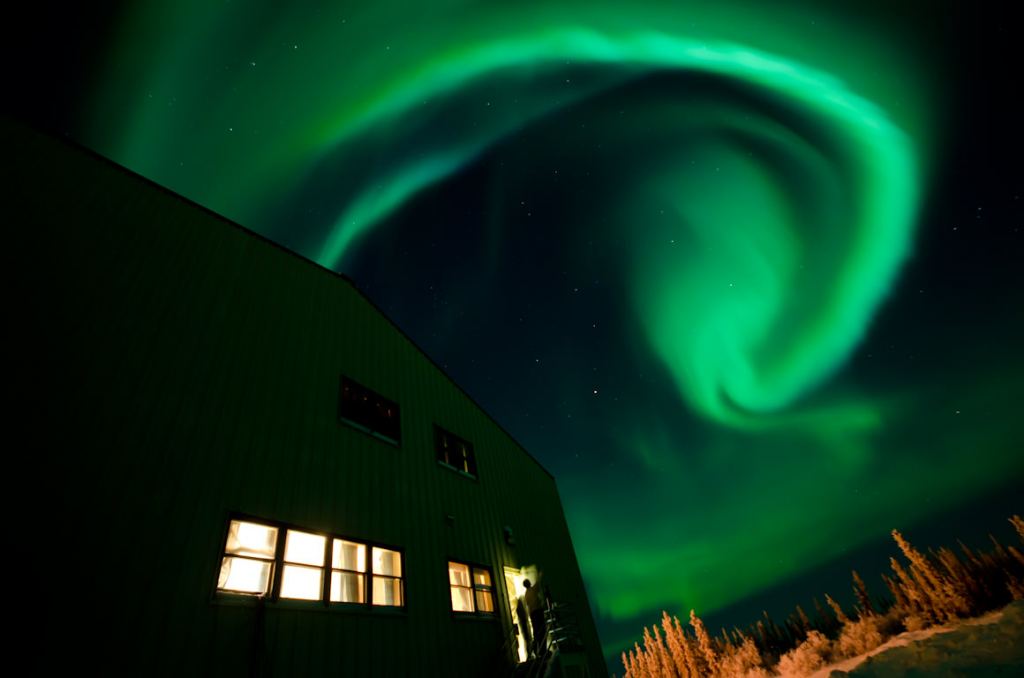 Spectacular image of a swirling aurora in the night sky.