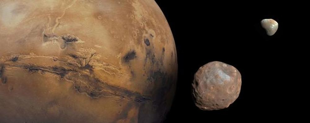 A composite image of Mars and its two moons, Phobos (foreground) and Deimos (background). Credit: NASA/JPL/University of Arizona