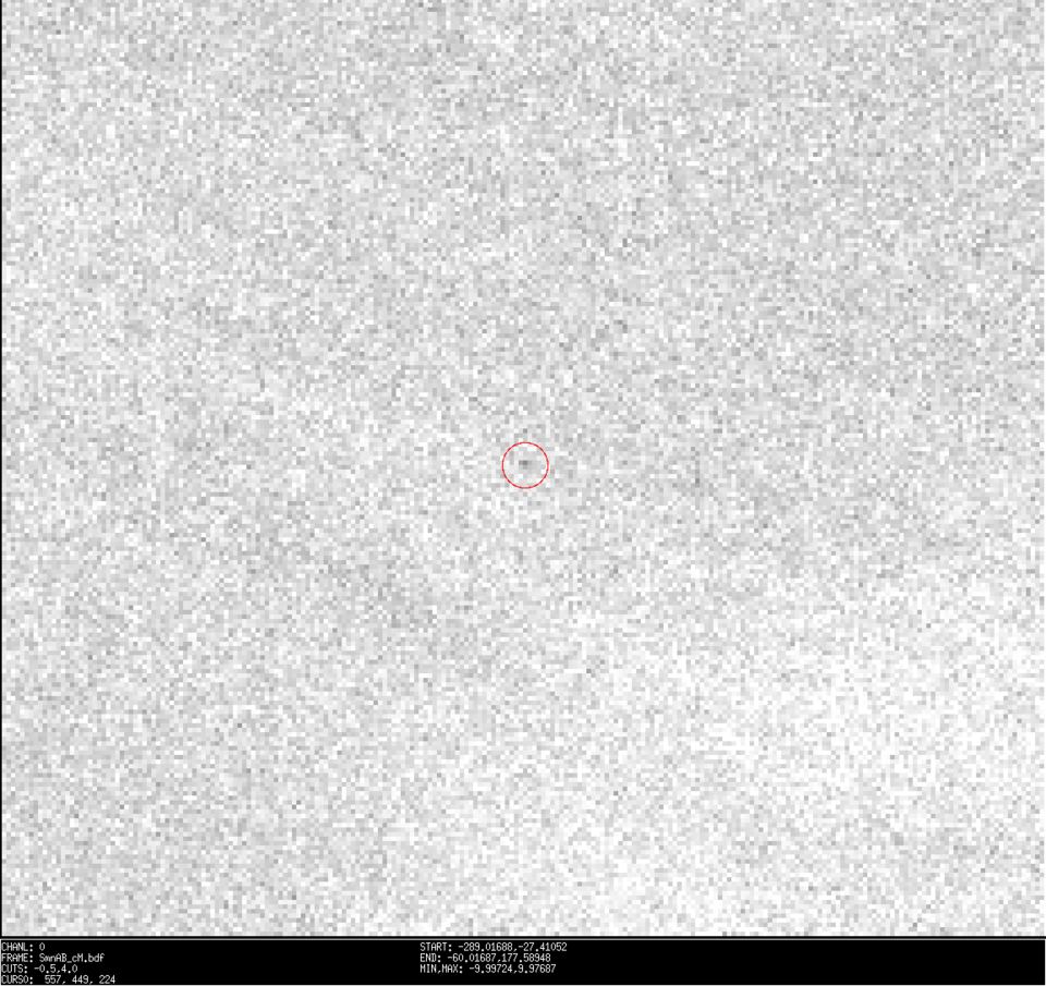 This was what the astronomers had to find.  The dot in the middle of the red circle is 2021 QM1.