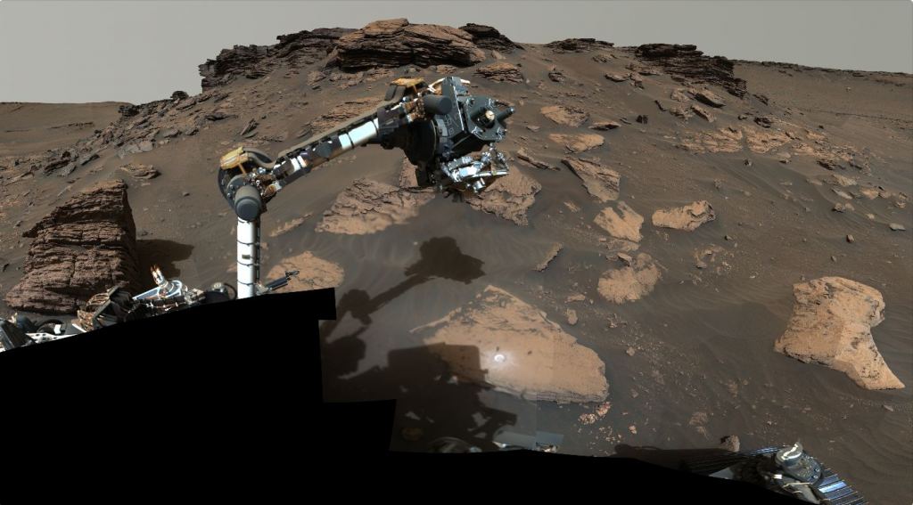 NASA’s Perseverance rover puts its robotic arm to work around a rocky outcrop called “Skinner Ridge” in Mars’ Jezero Crater. Perseverance gathered an important sample of sedimentary rock here. Credit: NASA/JPL-Caltech/ASU/MSSS
