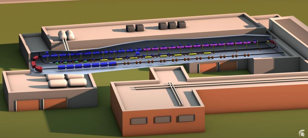 The Facility for Rare Isotope Beams is a linear accelerator shaped like a paper clip. The powerful accelerator propels atoms to speeds greater than 50% of the speed of light. Image Credit: FRIB/MSU.