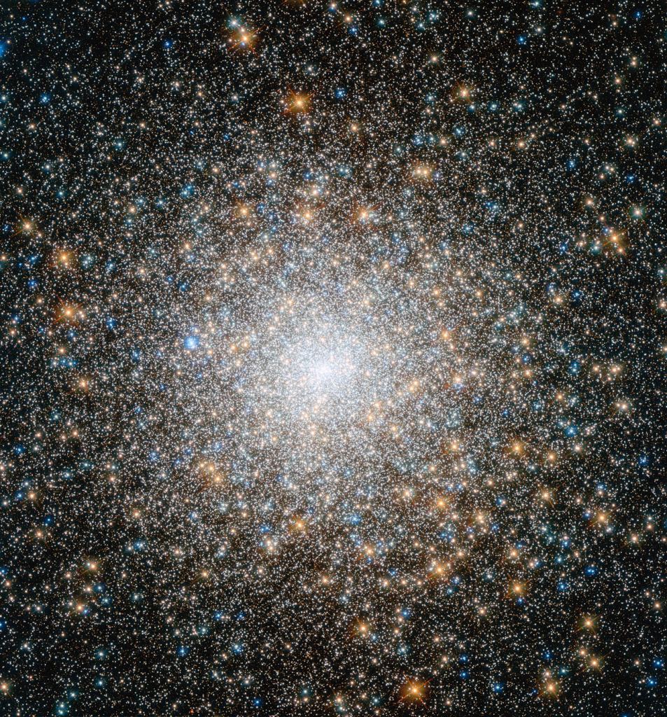 This is the globular cluster Messier 15, located some 35 000 light-years away in the constellation of Pegasus (The Winged Horse). It is one of the oldest globular clusters known, with an age of around 12 billion years. Both very hot blue stars and cooler golden stars can be seen swarming together in the image, becoming more concentrated towards the cluster's bright centre. Messier 15 is one of the densest globular clusters known, with most of its mass concentrated at its core. As well as stars, Messier 15 was the first cluster known to host a planetary nebula, and astronomers found a rare type of black hole at its centre. Image Credit: NASA/ESA