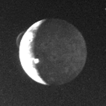 The discovery image from Voyager 1 of Io's volcanic plume. Courtesy NASA/JPL.