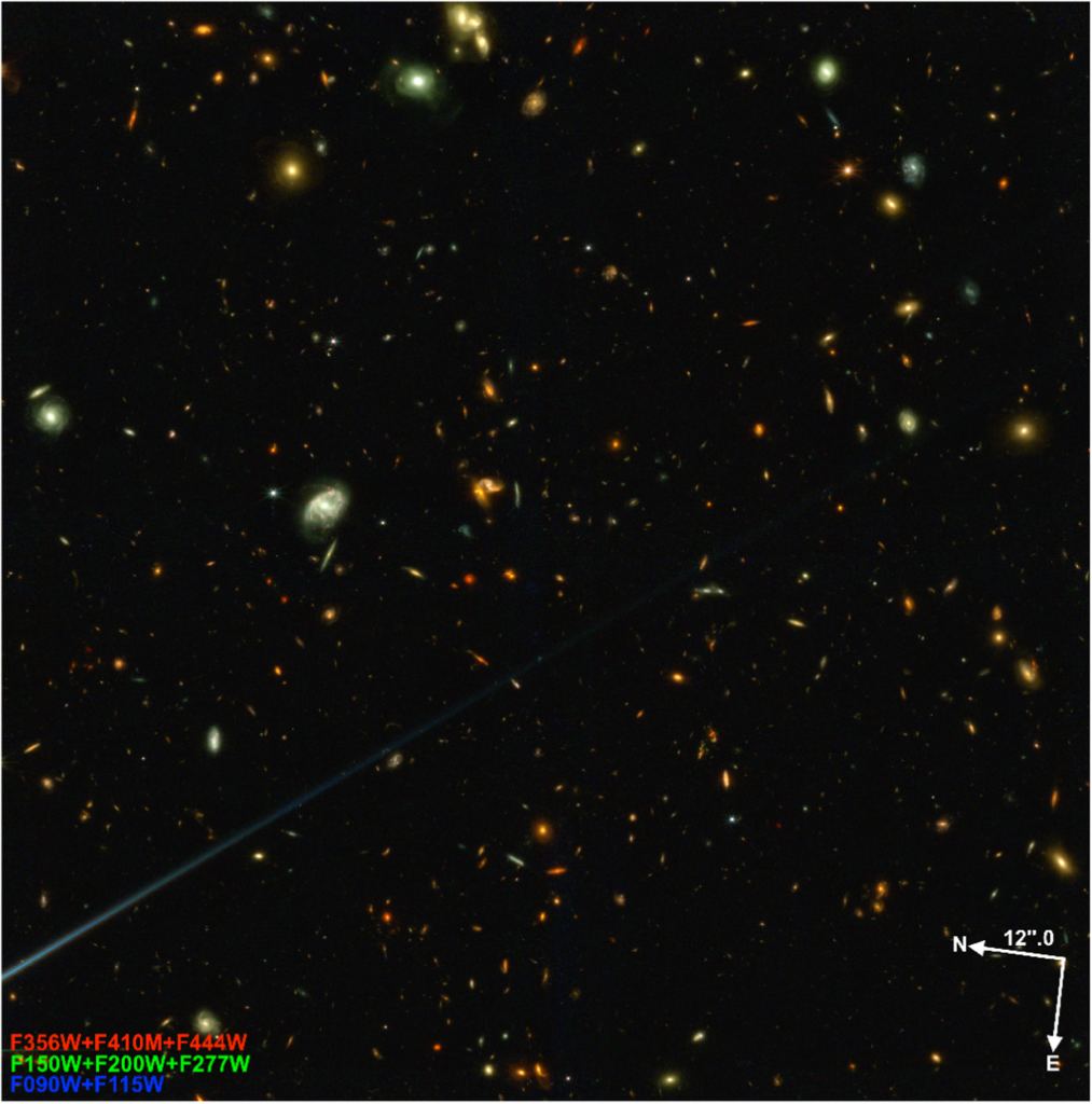 This image is of the El Gordo cluster, a cluster of galaxies chosen for its enormous mass. This image doesn't show the center of the cluster, but it has a 