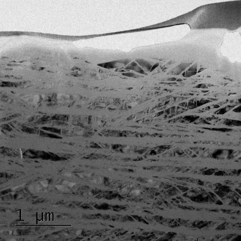 The impact simulated at the Jena lab creates tiny glass lamellae in quartz crystald. These structures are only tens of nanometers wide, so they had to be studied using an electron microscope. Courtesy: Falko Langenhorst, Christoph Otzen (University of Jena). 