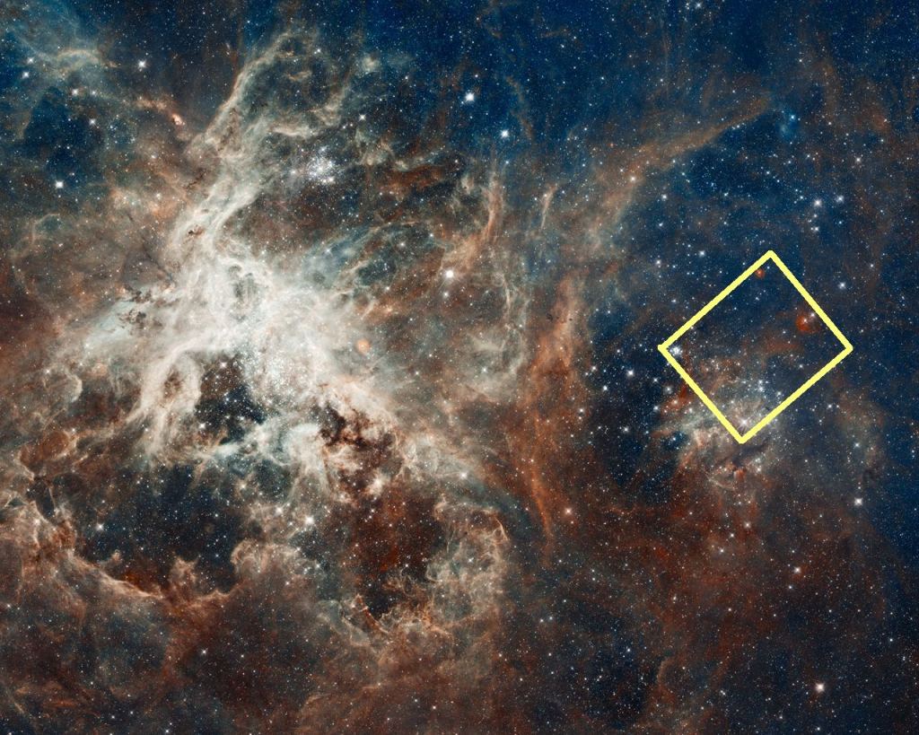 This image shows the wider structure of the Tarantula Nebula with the featured Hubble image outlined in yellow. Image Credit: NASA/ESA