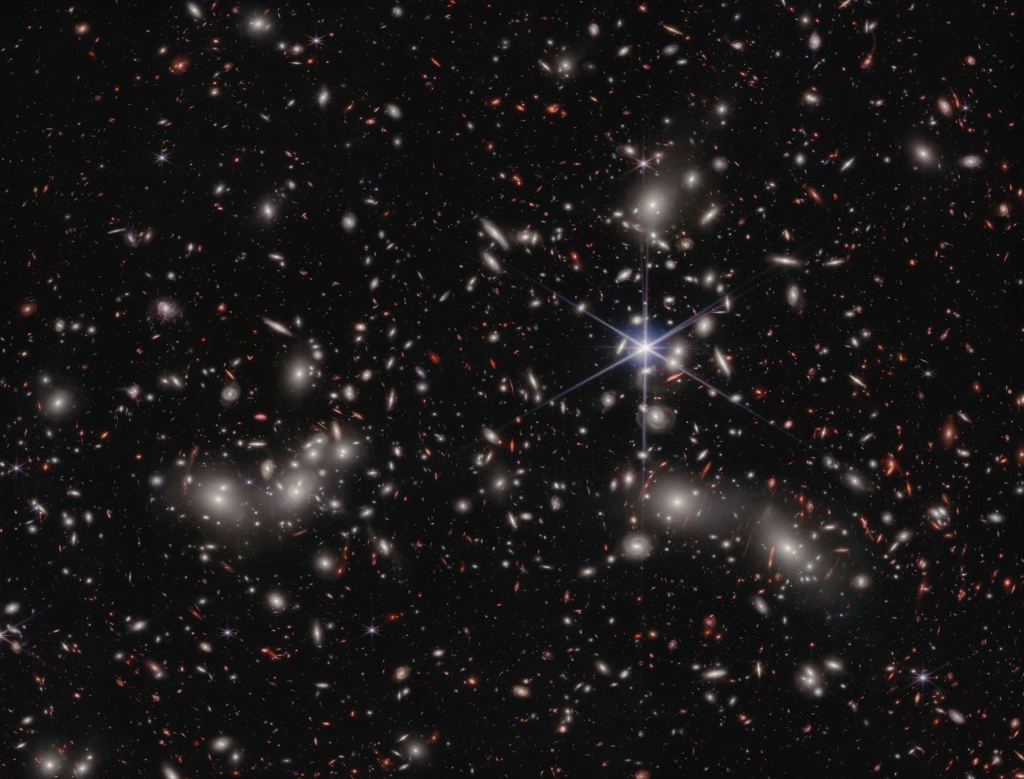 Webb Sees Three Galaxy Clusters Coming Together to Form a Megacluster