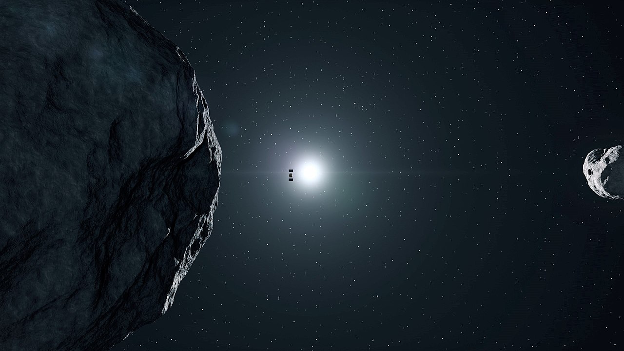 La ilustración de este artista muestra la nave espacial Hera de la ESA realizando operaciones de proximidad en Didymos. La misión se lanzará en 2024 y llegará al doble asteroide en diciembre de 2026. Crédito de la imagen: Por ESA – Science Office, CC BY-SA IGO 3.0, CC BY-SA 3.0 igo, https://commons.wikimedia.org/w /index.php?curid=90615537