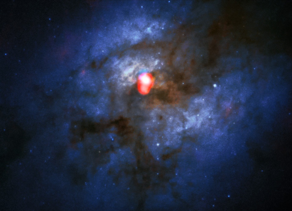 The compound view shows a new ALMA Band 5 image of the colliding galaxy system Arp 220 (in red) on top of an image from the NASA/ESA Hubble Space Telescope (blue/green). Though the double nucleus is invisible to Hubble, ALMA shows them clearly. Image Credit: By ALMA(ESO/NAOJ/NRAO)/NASA/ESA and The Hubble Heritage Team (STScI/AURA) - https://www.eso.org/public/images/eso1645a/, Public Domain, https://commons.wikimedia.org/w/index.php?curid=54356378