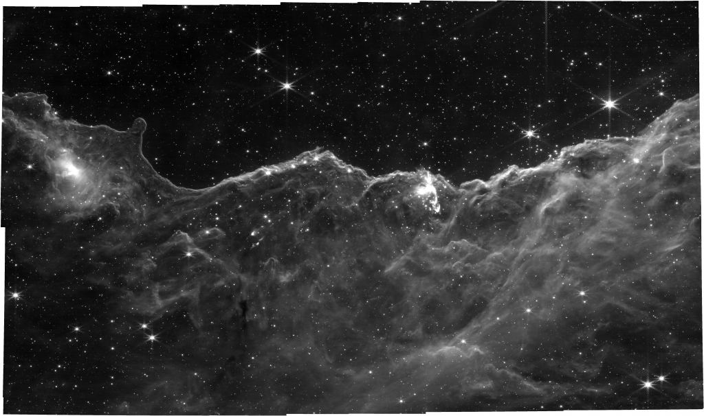 Otra imagen JWST sin procesar de la característica 'Cosmic Cliffs' en NGC 3324. Esta fue capturada con NIRCAM y su filtro F444W.  Crédito de la imagen: NASA, ESA, CSA y STScI