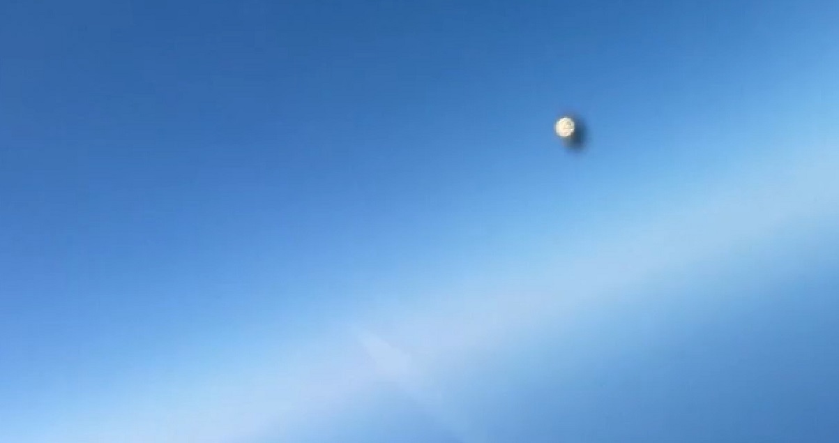 Freeze frame of bright circular-looking object in Navy fighter jet video