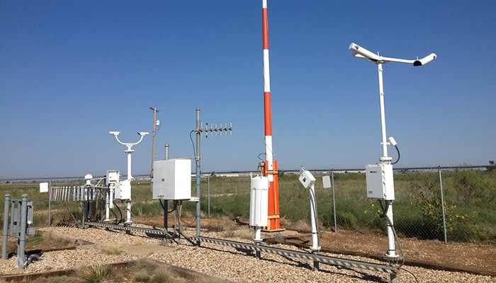 A NOAA Automated Surface Observing System (ASOS) weather station at the Childress Municipal Airport in Childress, Texas. ASOS stations constantly monitor weather conditions on Earth’s surface. More than 900 stations across the United States report data about sky conditions, surface visibility, precipitation, temperature and wind up to 12 times an hour.  Measurements from stations like these form a huge database of information about temperatures such as those in July 2023. Credit: NOAA