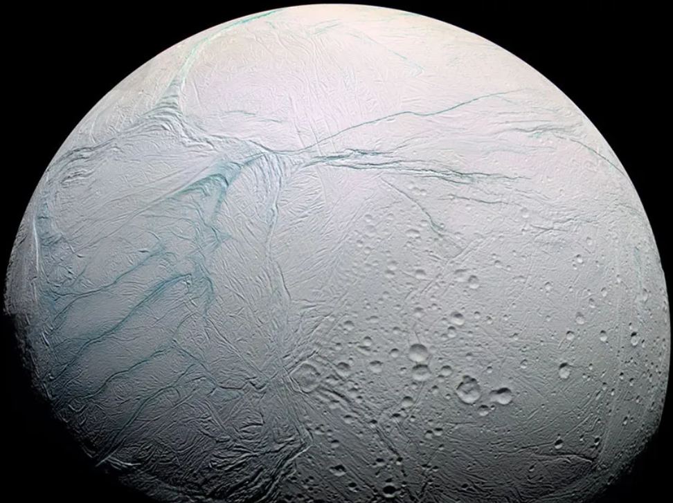 Saturn's moon Enceladus isn't just bright and beautiful. It has an ocean under all that ice that has chemicals necessary for life. This image shows the moon's southern region, including the 'Tiger Stripes' feature, the four roughly parallel streaks on the left of the image. This is where the plumes originate. Image Credit: NASA, ESA, JPL, SSI, Cassini Imaging Team