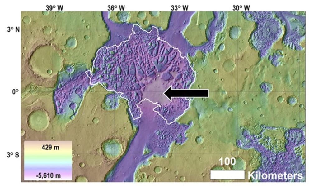 This figure from the study shows Hydraotes Chaos (white outline), including the location of the proposed mud lake (black arrow). Image Credit: Rodriguez et al. 2023/NASA. 