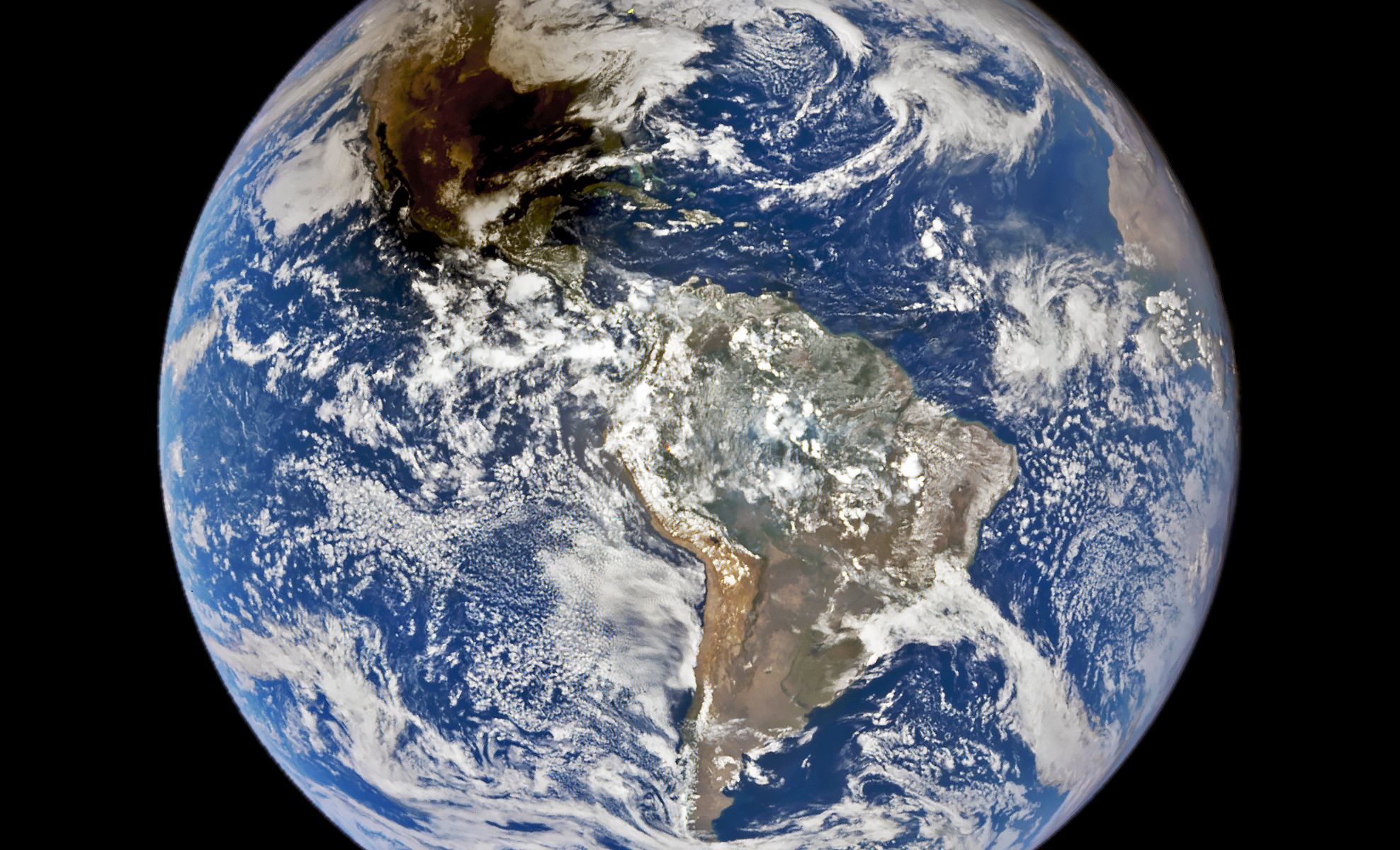 As the Moon crossed between the Sun and Earth during the 2023 annular eclipse, its shadow darkened skies across the United States. NASA image courtesy of the DSCOVR EPIC team.