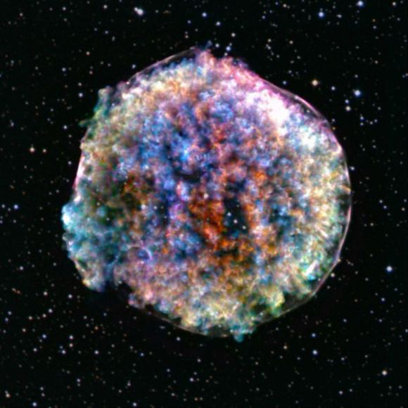 X-ray image of the Tycho supernova, also known as SN 1572, located between 8,000 and 9,800 light-years from Earth. Its core collapse could result in a neutron star or a black hole, depending on final mass. (Credit: X-ray: NASA/CXC/RIKEN & GSFC/T. Sato et al; Optical: DSS)