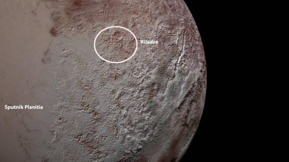 Kiladze (circled) is likely a super cryovolcano on Pluto. It contains fault structures and collapse pits that could be formed through cryovolcanism. The crater (or caldara) shape is distorted, likely from internal stresses and tectonic shifting. Courtesy New Horizons mission (labeled by author). 