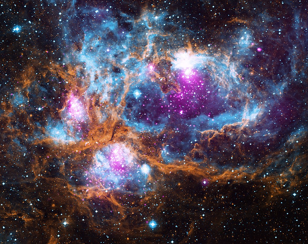 This composite image contains X-ray data from NASA’s Chandra X-ray Observatory and the ROSAT telescope (purple), infrared data from NASA’s Spitzer Space Telescope (orange), and optical data from the SuperCosmos Sky Survey (blue) made by the United Kingdom Infrared Telescope. Located in our galaxy about 5,500 light years from Earth, NGC 6357 is actually a “cluster of clusters,” containing at least three clusters of young stars, including many hot, massive, luminous stars. The X-rays from Chandra and ROSAT reveal hundreds of point sources, which are the young stars in NGC 6357, as well as diffuse X-ray emission from hot gas