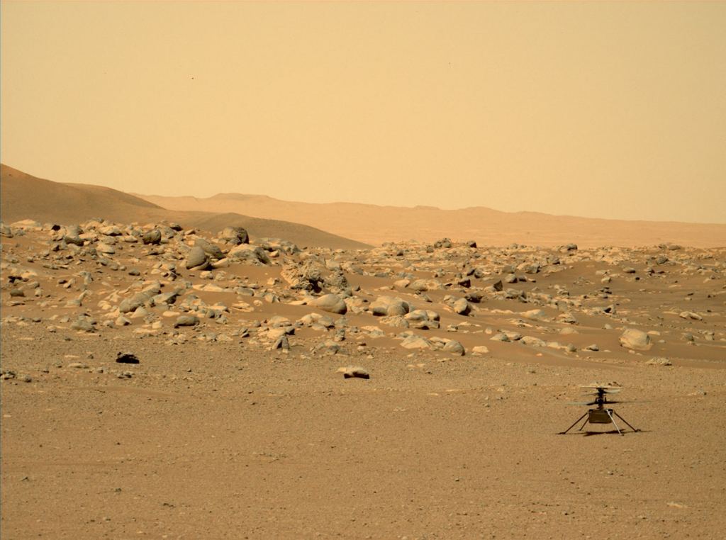 The Perseverance Rover's Mastcam-Z instrument captured this image of NASA's Ingenuity Mars Helicopter on June 15, 2021, the 114th Martian day, or sol, of the mission. The location, "Airfield D" (the fourth airfield), is just east of the "Séítah" geologic unit. Credits: NASA/JPL-Caltech/ASU/MSSS.