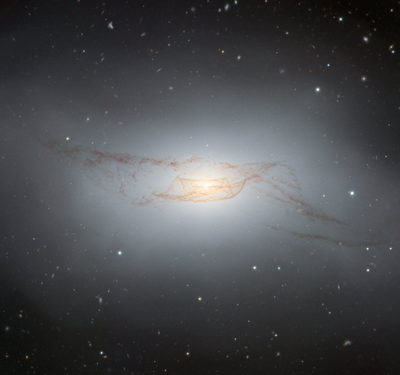 The Gemini South telescope view of NGC 4753, a peculiar galaxy thought to have experienced a galactic merger. Courtesy International Gemini Observatory/NOIRLab/NSF/AURA