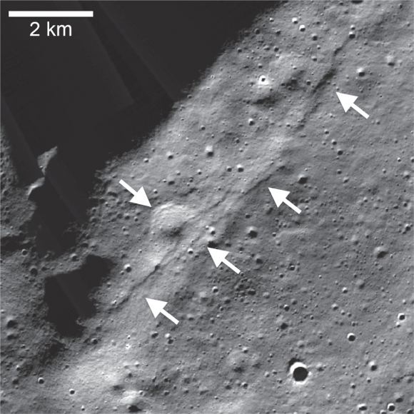 An LROC NAC mosaic of the Wiechert cluster of lobate scarps in Moon's south pole region, left pointing arrows). A scarp crosscuts a small (?1 km) degraded crater (right pointing arrow).