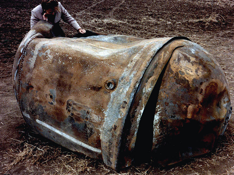 This is the main propellant tank of the second stage of a Delta 2 launch vehicle, which landed near Georgetown, TX, on 22 January 1997. This approximately 250 kg tank is primarily a stainless steel structure and survived reentry relatively intact. Image Credit: NASA ODPO.