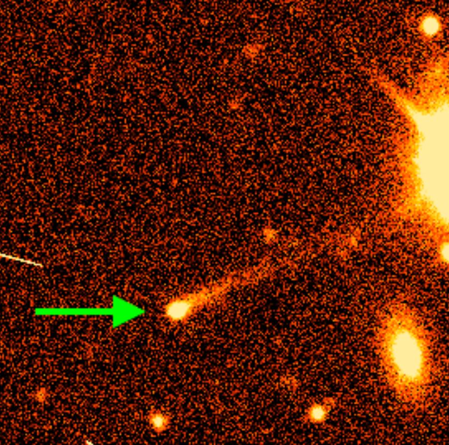 This image shows one of the active asteroids found by citizen scientists involved with the Active Asteroid project. It's named 2015 VA108, and the green arrow highlights the asteroid and its tail. Image Credit: Colin Orion Chandler (University of Washington)