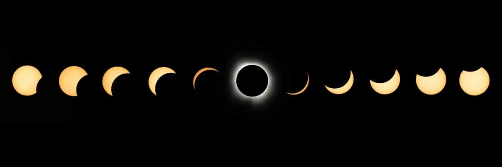 A composite of images taken during the total solar eclipse showing all the phases leading up to and after totality. NASA/Keegan Barber. 